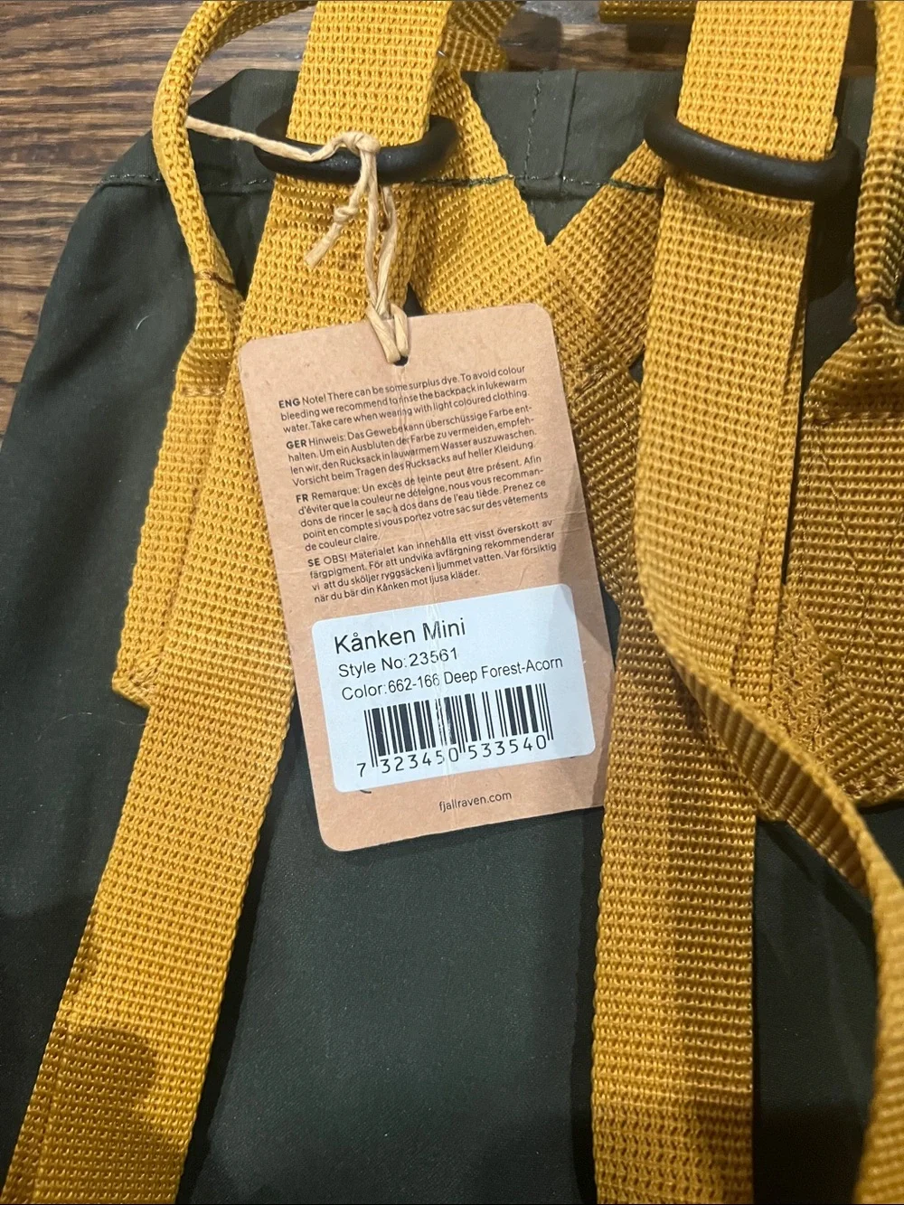 Fjallraven Kanken Mini Backpack in Dark Green with Yellow Straps